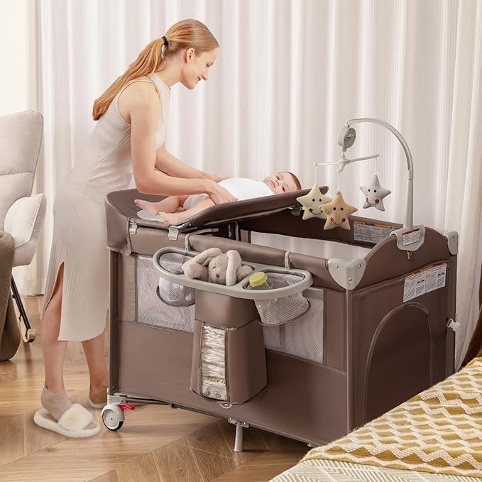 BABY JOY 5-in-1 Pack and Play, Portable Baby Bedside Sleeper with Bassinet, U-Shaped Diaper Changer, Safety Strap, Side Zipper Entrance, Bedside Crib Playard from Newborn to Toddlers (Coffee)