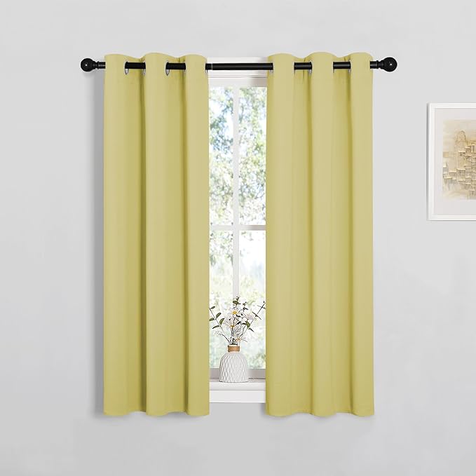 NICETOWN Window Curtain Panels, Thermal Insulated Solid Grommet Blackout Draperies/Drapes for Basement (Paler Yellow, 1 Pair, 29 by 45-inch)