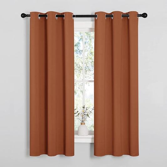 NICETOWN Halloween Blackout Curtain Panels for Girls Room, Nursery Essential Thermal Insulated Solid Grommet Top Blackout Drapes (Burnt Orange, 1 Pair, 34 x 63 Inch)
