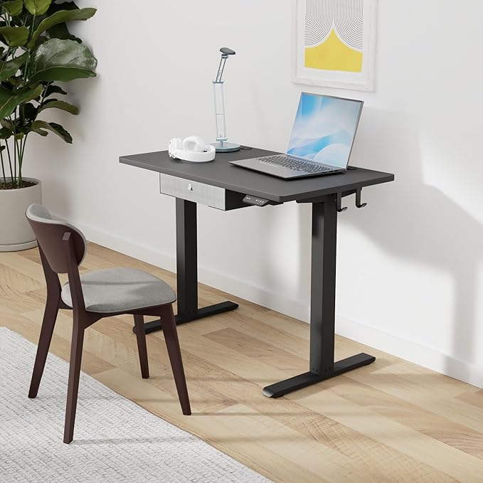 FEZIBO 40 x 24 Inches Standing Desk with Drawer, Adjustable Height Electric Stand up Desk with Storage, Sit Stand Home Office Desk, Ergonomic Computer Desk, Black