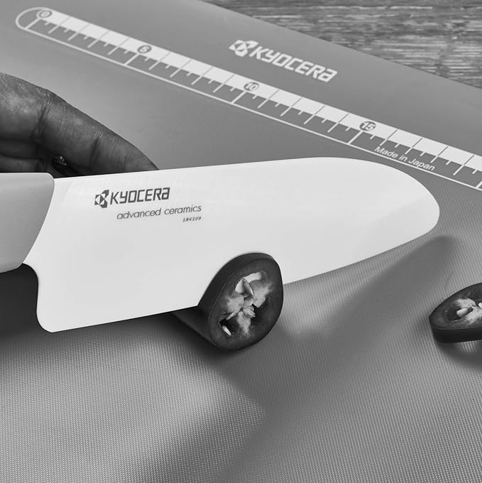 Kyocera’s Revolution Series 5.5” Ceramic Santoku Knife, Chef Knife For Your Cooking Needs, Orange Handle, White Blade