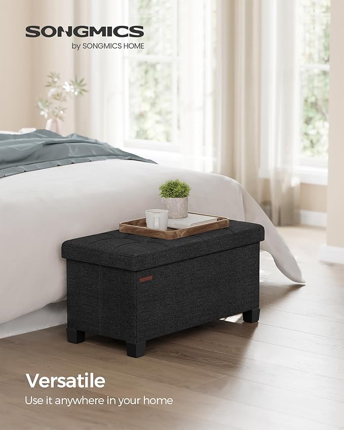 SONGMICS Storage Ottoman Bench, Foldable Foot Rest with Legs, 15 x 30 x 15.2 Inches, End of Bed Bench, Storage Chest, Load up to 660 lb, for Living Room, Bedroom, Entryway, Ink Black ULSF016B01