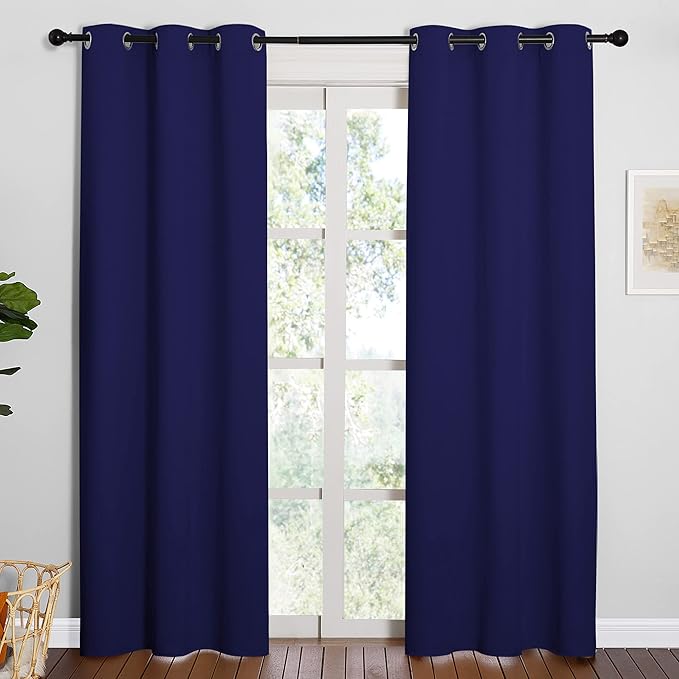 NICETOWN Window Treatment Energy Saving Thermal Insulated Solid Grommet Blackout Curtains/Drapes for Living Room (Royal Blue, 1 Pair, 42 by 84-Inch)