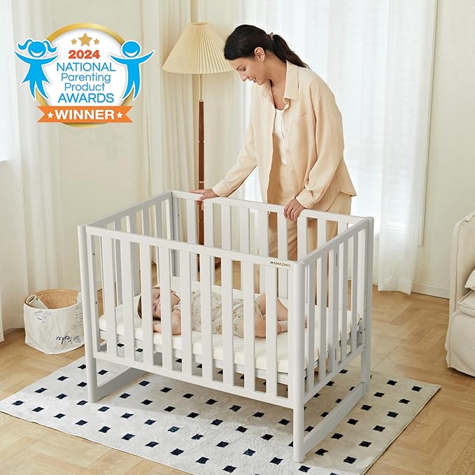 EvoNook 6-in-1 Convertible Mini Crib, 100% New Zealand Solid Wood, 4 Adjustable Mattress Heights, Crib with Mattress, White