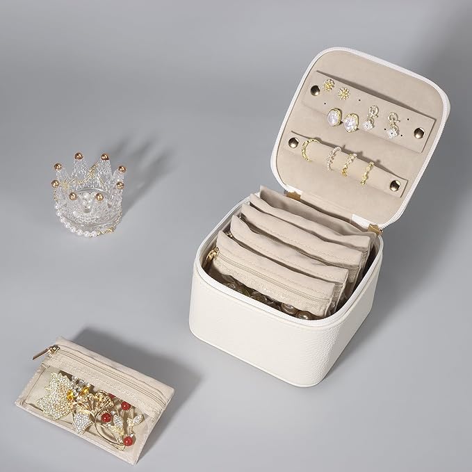 DesignSter Small Jewelry Box, Travel Small Jewelry Organizer with Earring Tray and Ring Holder, Square Travel Jewelry Storage Case with 6 Velvet Jewelry Pouches, Beige