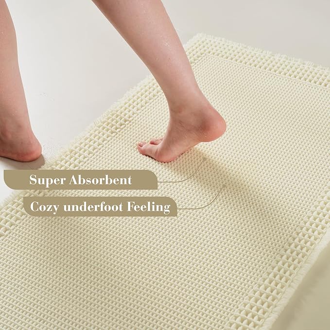 RESARE Waffle Bath Mat for Bathroom, Super Absorbent Bathroom Rugs Non Slip Machine Washable, Ultra Soft Quick Dry Boho Bath Rugs with Tassels for Floor, Upgraded Bordered Design, 24"x36" Cream