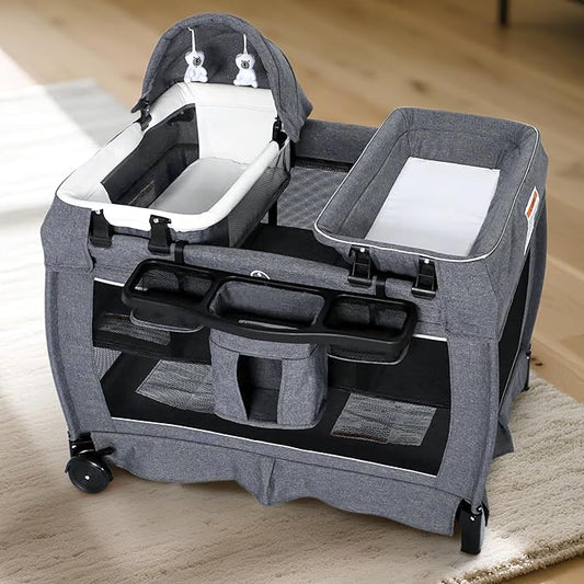 Kinder King 4 in 1 Foldable Pack n Play with Bassinet & Changing Table, Portable Nursery Center for Babies and Toddlers, Convertible Newborn Crib Baby Bed with Toys & Canopy, Storage Bag, Light Gray