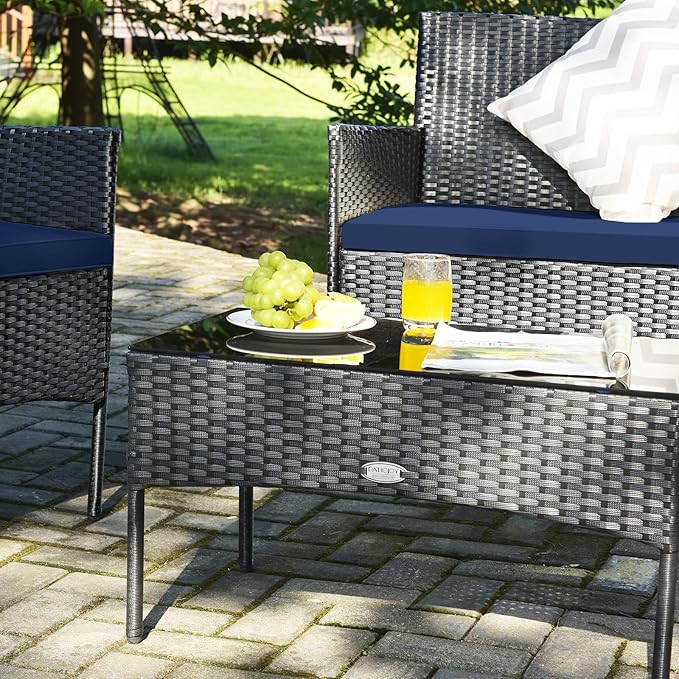 Tangkula 4 Pieces Patio Furniture Set, Outdoor Wicker Conversation Set with Tempered Glass Tabletop, Rattan Sofa and Chairs Set with Off White & Navy Cushion Covers
