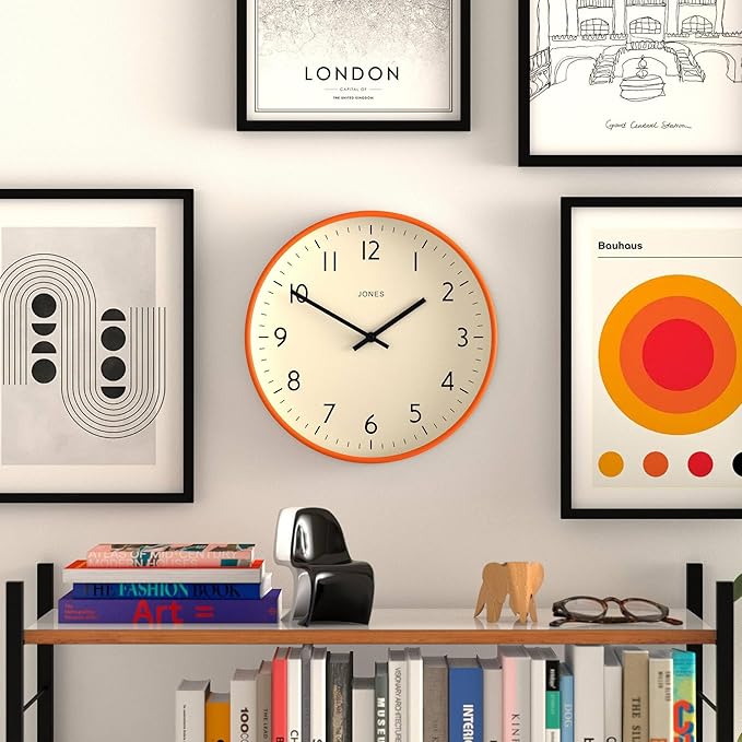JONES CLOCKS® Studio Wall Clock | Modern Round Clock | 12 inch | Orange | Easy to Read Numbers | Versatile Design for Kitchen, Living Room or Office