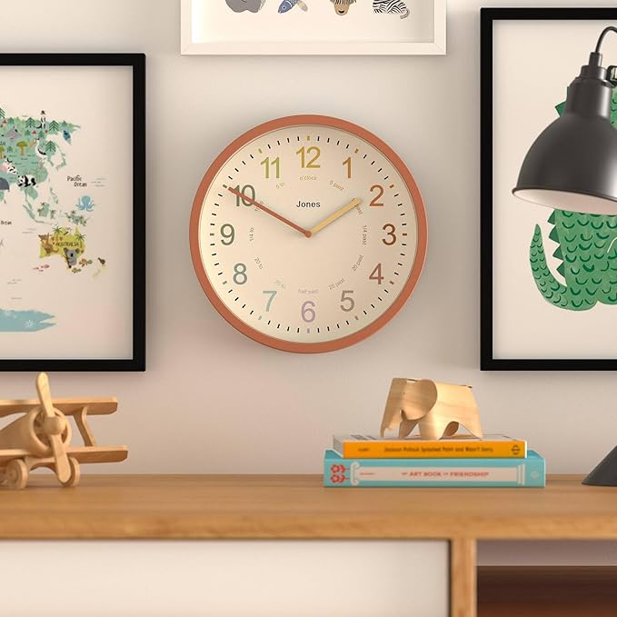 JONES CLOCKS® Kids Wall Clock | Small Modern Children’s Clock | 10 inch | Terracotta Orange | Colourful Numbers | Learn to Tell The time