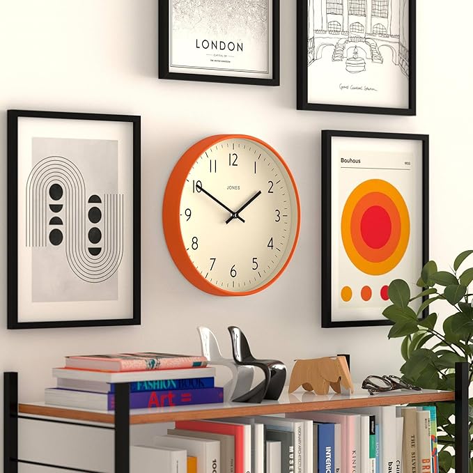 JONES CLOCKS® Studio Wall Clock | Modern Round Clock | 12 inch | Orange | Easy to Read Numbers | Versatile Design for Kitchen, Living Room or Office