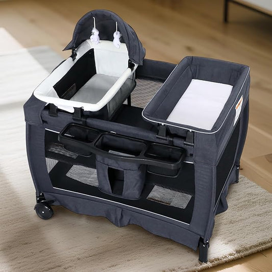 Kinder King 4 in 1 Foldable Pack n Play with Bassinet & Changing Table, Portable Nursery Center for Babies and Toddlers, Convertible Newborn Crib Baby Bed with Toys & Canopy, Storage Bag, Dark Gray