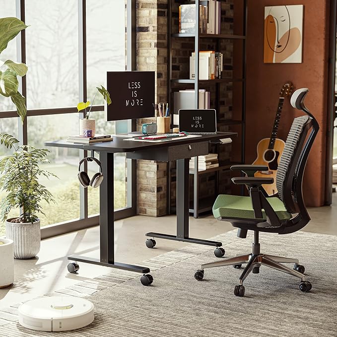 FEZIBO 48 x 24 Inches Standing Desk with Drawer, Adjustable Height Electric Stand up Desk with Storage, Sit Stand Home Office Desk, Ergonomic Computer Desk, Black