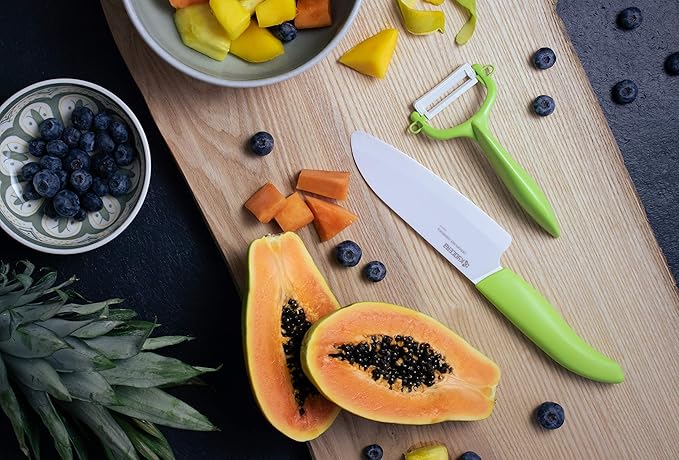 Kyocera’s Revolution Series 5.5” Ceramic Santoku Knife, Chef Knife For Your Cooking Needs, Green Handle, White Blade
